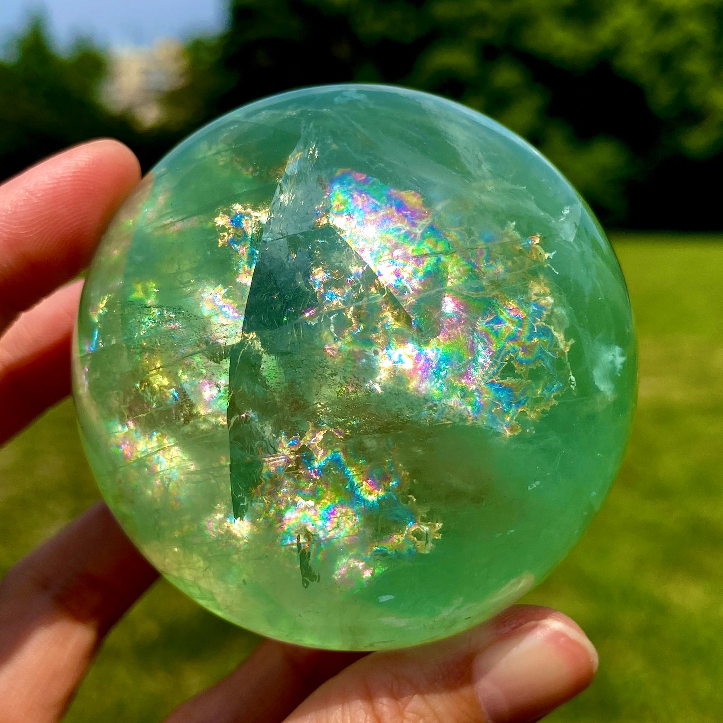 Green Fluorite Sphere with Big Rainbow